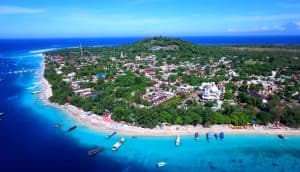 Aerial view of Gili Islands with beaches and lush greenery.